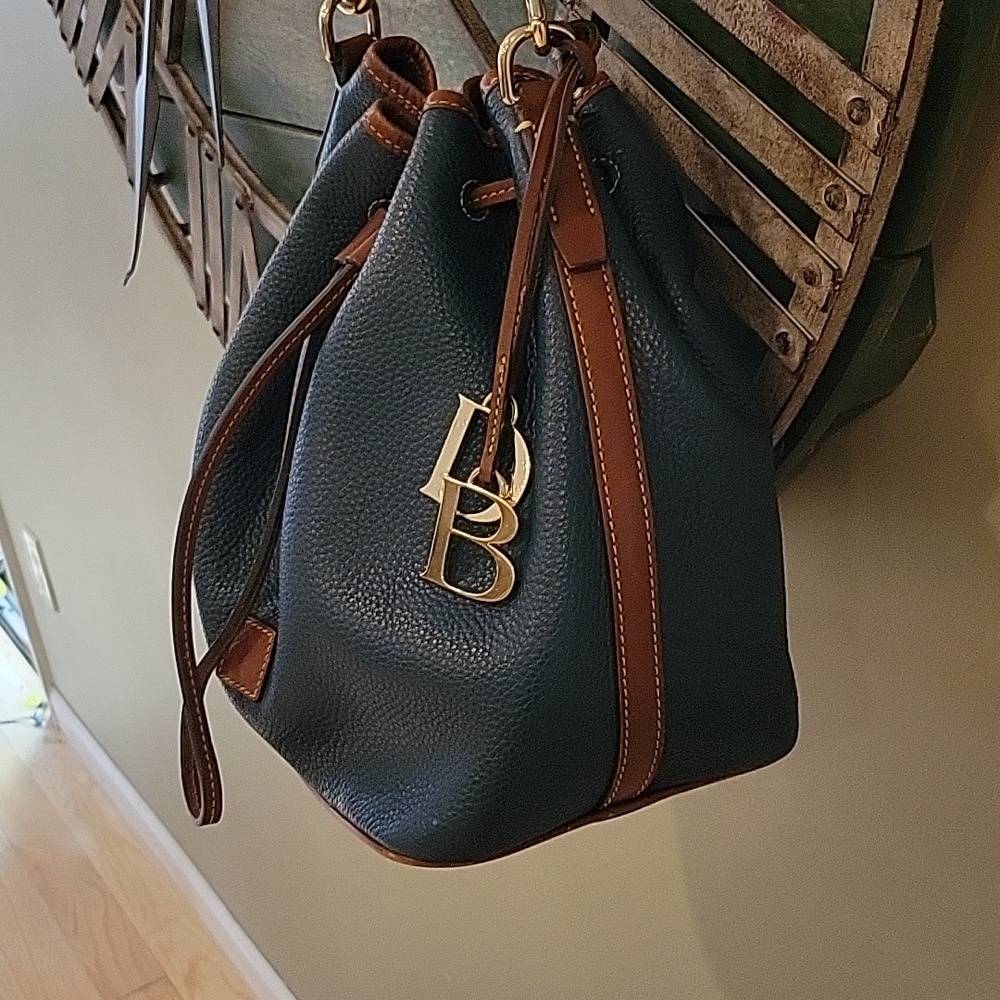 Dooney & Bourke Pebbled Leather Drawstring Bucket Bag With Gold Hardware & Charm - Picture 4 of 16